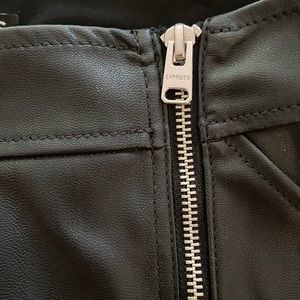 High waisted black pleather skirt with zipper.